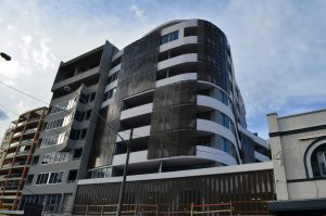 Building metal facade - perforated panels by Arrow Metal