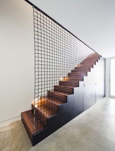 interior use of metal - Woven wire metal staircase