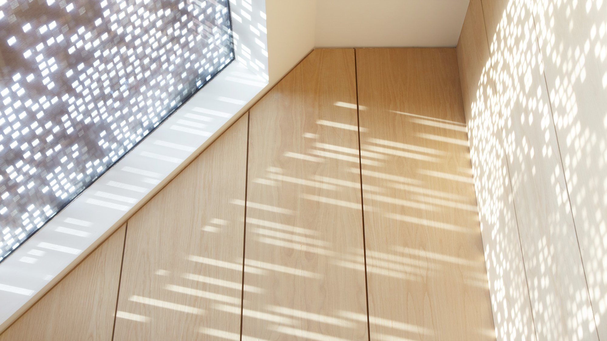 Square hole perforated metal walls - residential project