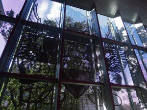 Perforated metal using photos - check out wayside chapel building facade