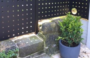 Bespoke perforated metal fence panels by Arrow Metal at a Sydney residence