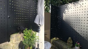 Bespoke perforated metal fence panels by Arrow Metal at a Sydney residence