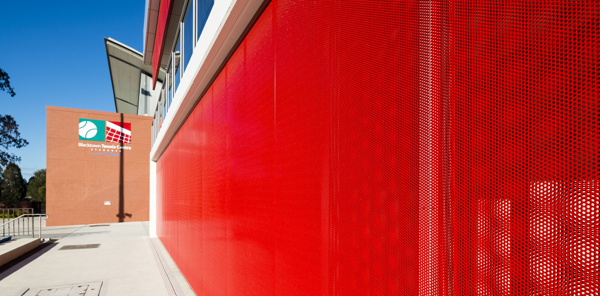 Red Perforated metal - Blacktown tennis centre mural wall