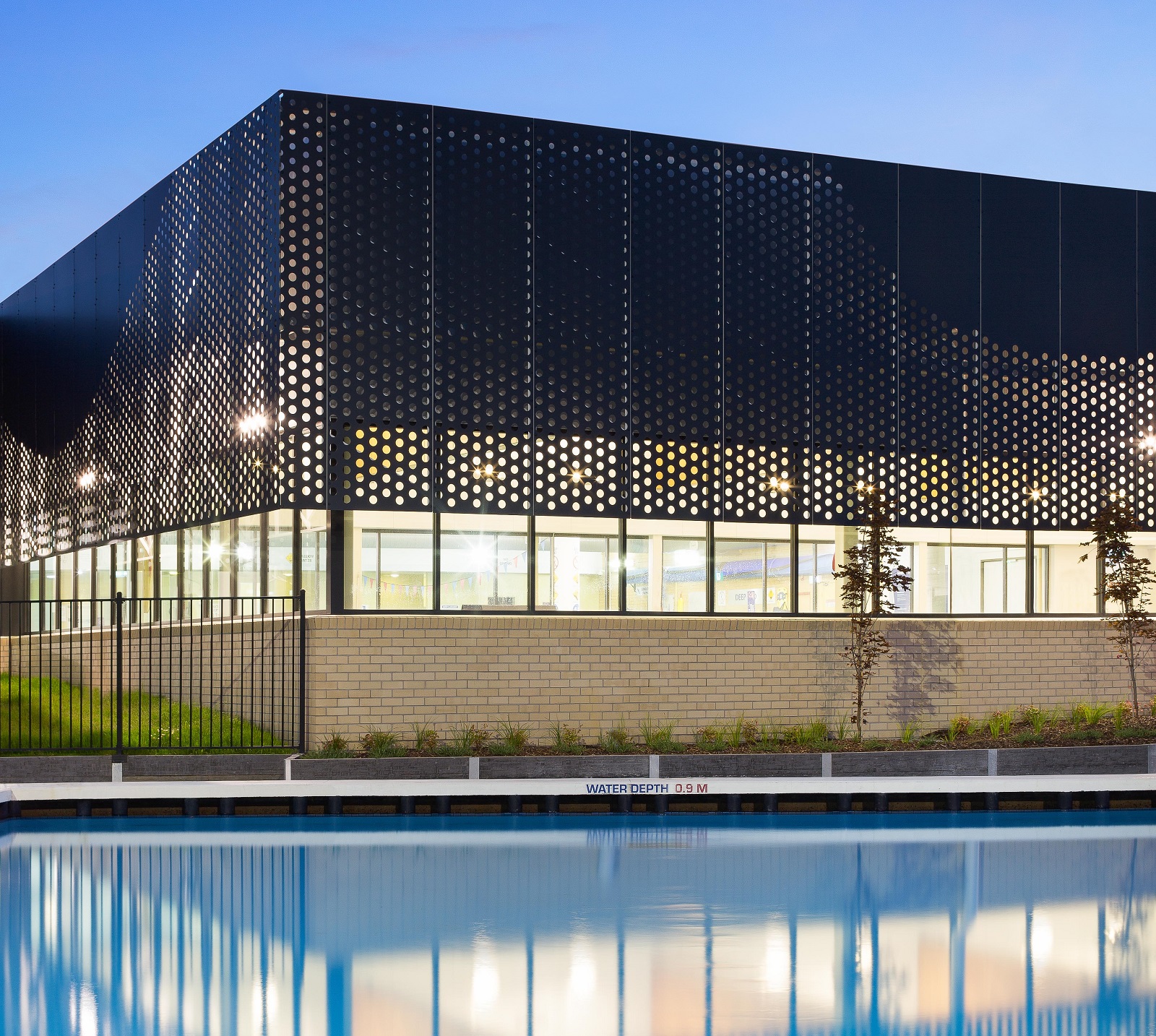 Perforated sheet metal facade by Arrow Metal - Bunburry Swimming Pool project