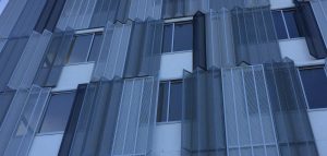 Perforated sheet by Arrow Metal - Infinity Apartments folded private screen panels