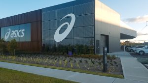 Perforated panels by Arrow Metal created a green wall for the new Asics Oceania HQ
