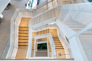 Bespoke perforated metal design by Arrow Metal - Staircase at 100 Mount St., Sydney
