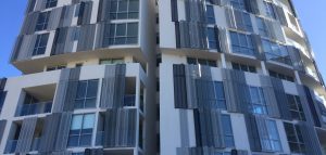 Perforated metal privacy screens - Infinity Apartment Block