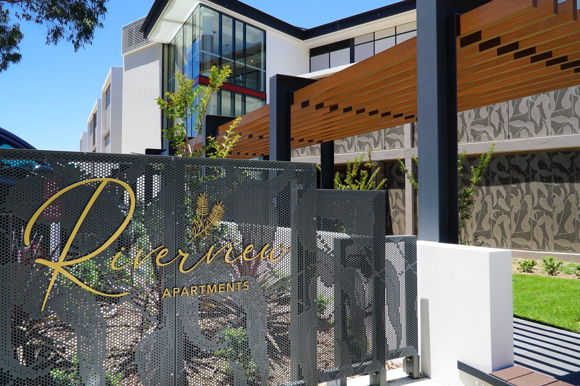 Carrington Age Care - Riverview apt - bespoke perforated metal Signage